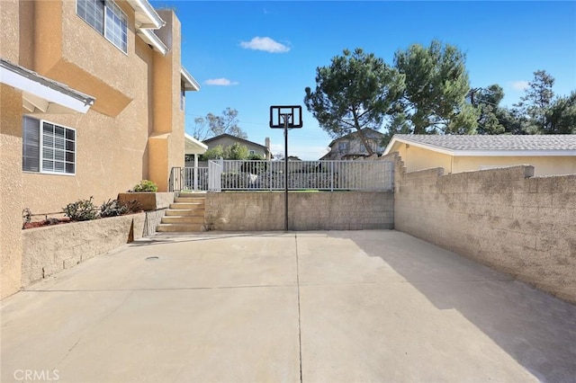 view of patio with fence