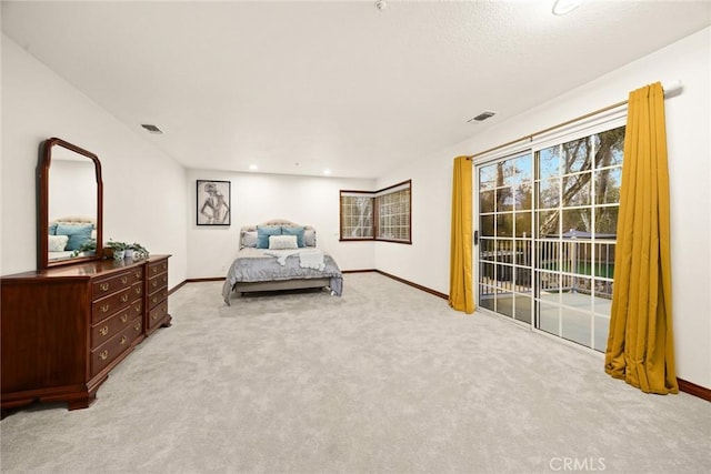 bedroom featuring light carpet, access to outside, visible vents, and baseboards