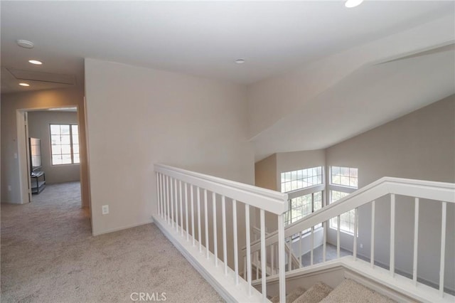 corridor featuring carpet flooring and recessed lighting