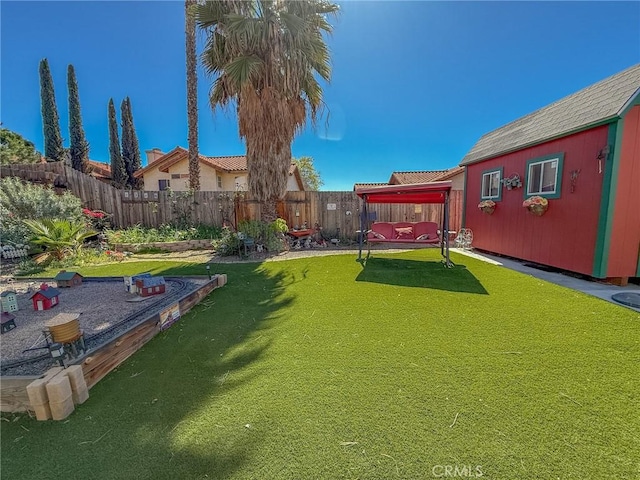 view of yard with a fenced backyard