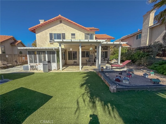 back of house with a patio, fence, a sunroom, and stucco siding