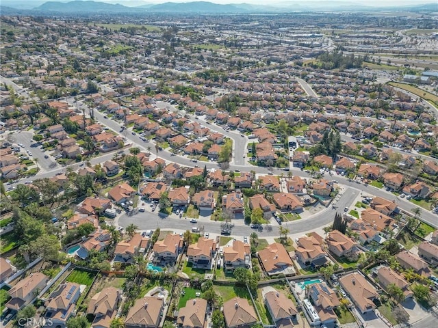 aerial view with a mountain view and a residential view