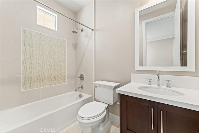 bathroom featuring toilet, vanity, and shower / bathing tub combination