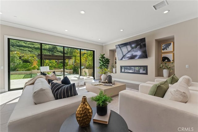 living area featuring recessed lighting, visible vents, baseboards, and ornamental molding