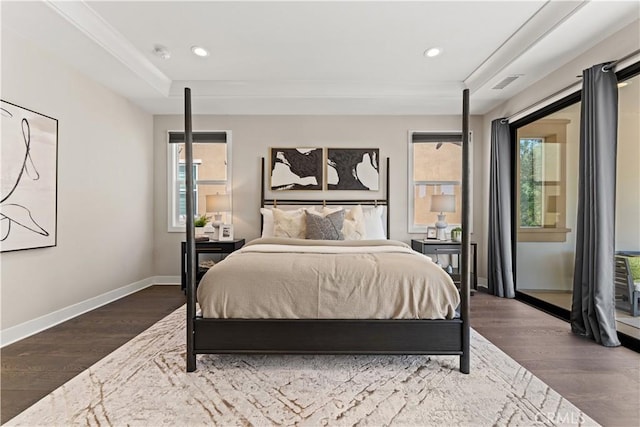 bedroom featuring dark wood-style flooring, recessed lighting, and baseboards