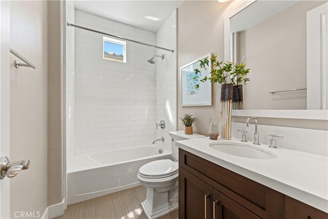 full bathroom featuring toilet, vanity, and shower / bathing tub combination