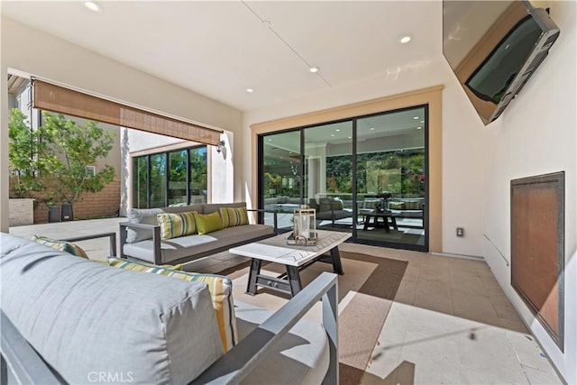 living room featuring recessed lighting