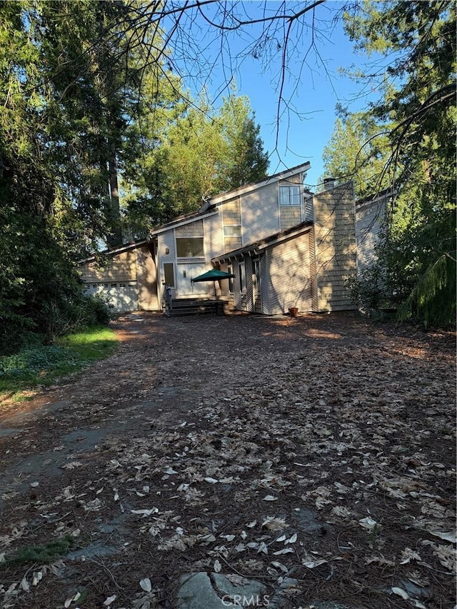 exterior space with a chimney