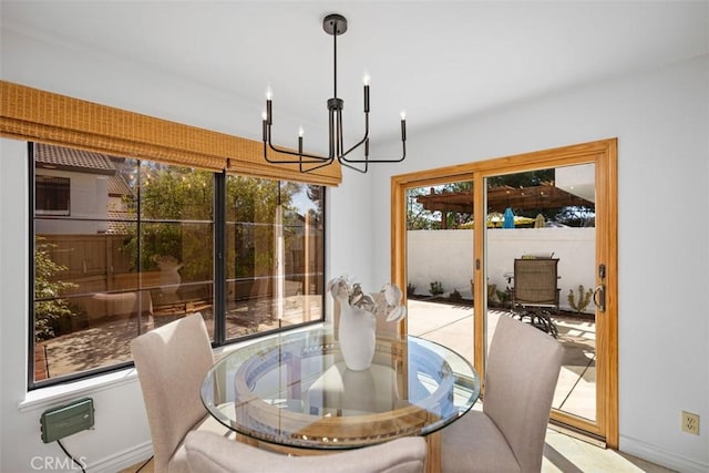 dining room with a chandelier