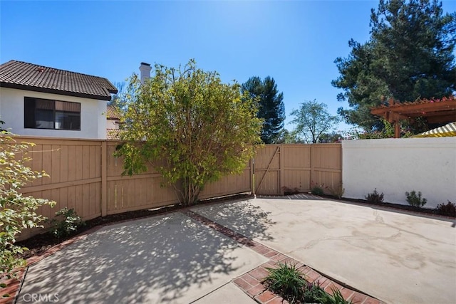 view of patio / terrace with fence