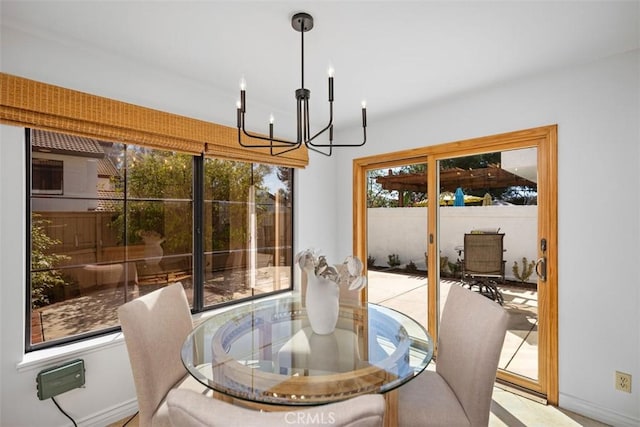 dining room with a notable chandelier