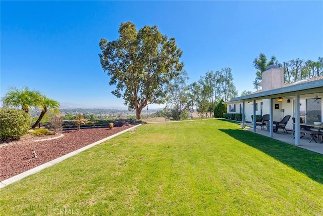 view of yard with a patio area