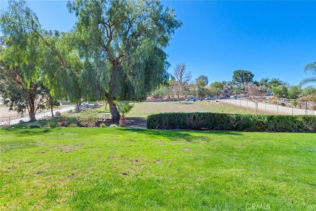 view of yard featuring fence