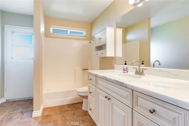 full bath with tile patterned flooring, shower / tub combination, vanity, and toilet