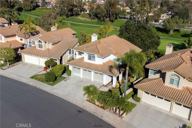 aerial view with a residential view and golf course view