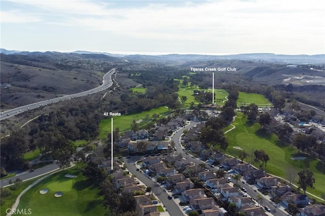 birds eye view of property with a residential view and a mountain view