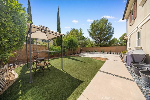 view of yard featuring a fenced backyard and a patio