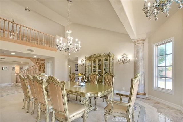 dining space with a chandelier, visible vents, baseboards, stairway, and ornate columns