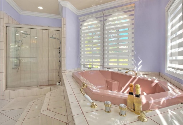 bathroom with a stall shower, a tub with jets, crown molding, and tile patterned floors