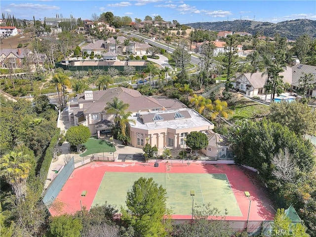 aerial view featuring a mountain view and a residential view