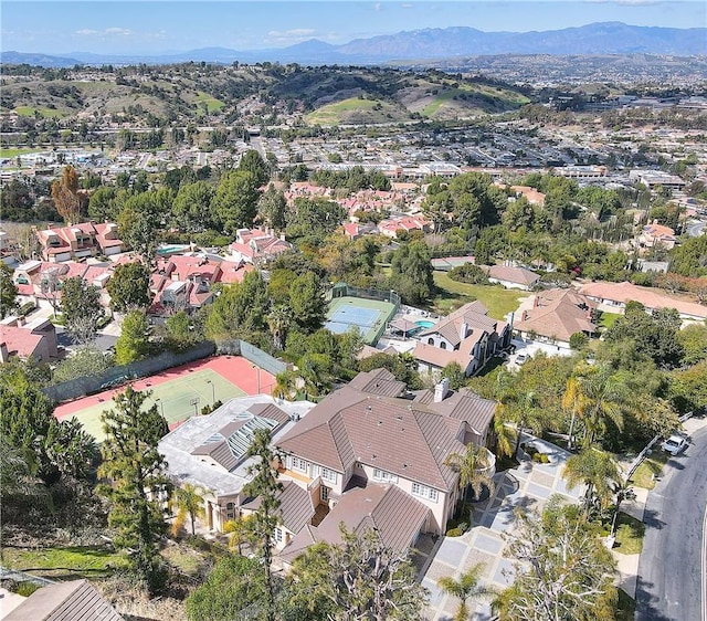 birds eye view of property with a residential view and a mountain view