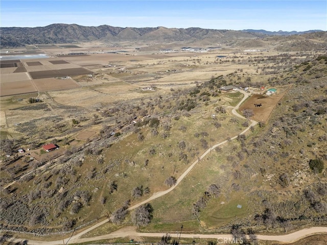 bird's eye view with a mountain view