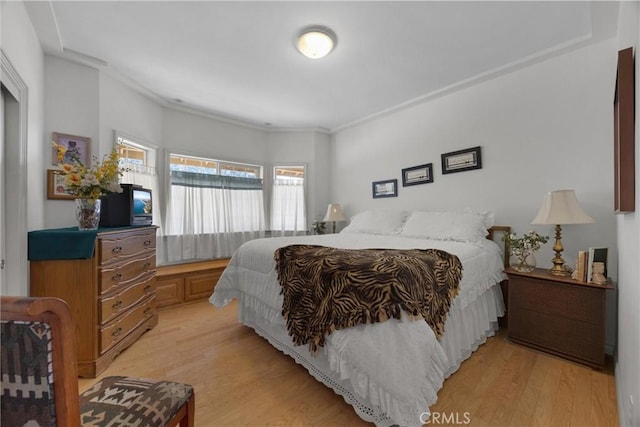 bedroom featuring light wood-type flooring