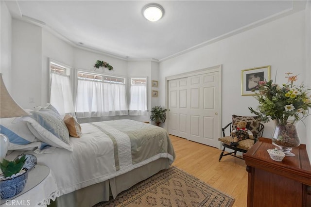 bedroom with light wood-style floors