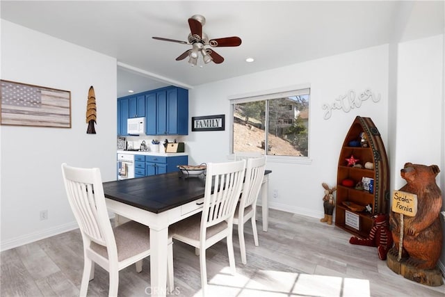 dining room with light wood-type flooring, ceiling fan, baseboards, and recessed lighting