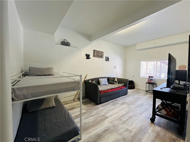 bedroom featuring wood finished floors
