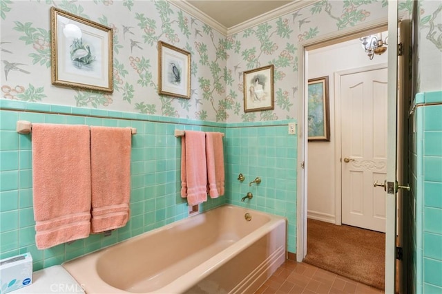 full bath featuring wallpapered walls, crown molding, a garden tub, and a wainscoted wall