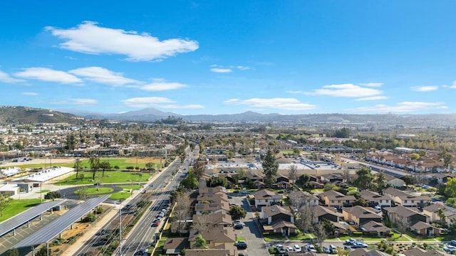 bird's eye view featuring a residential view and a mountain view