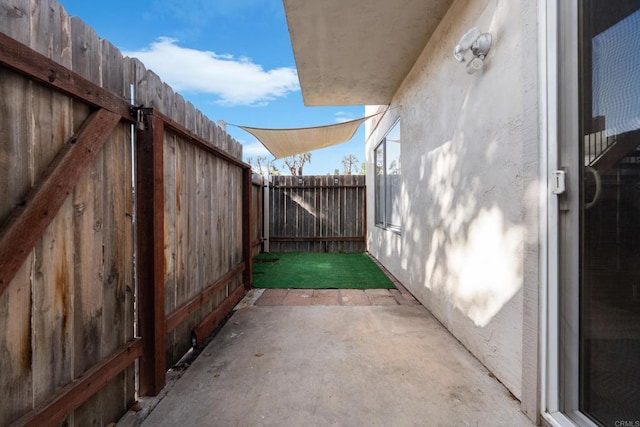 view of patio with a fenced backyard