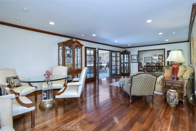 living room with crown molding, recessed lighting, french doors, and dark wood finished floors