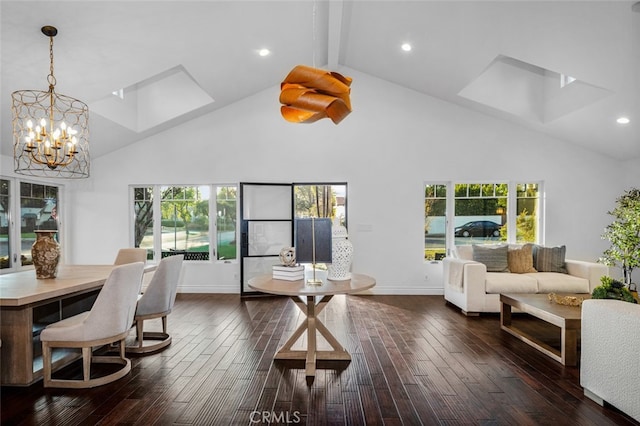 dining room featuring a healthy amount of sunlight, a skylight, high vaulted ceiling, and dark wood finished floors