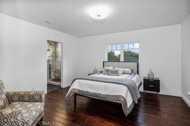 bedroom with baseboards, visible vents, and hardwood / wood-style floors