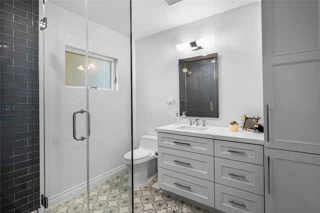 full bath featuring tile patterned flooring, a shower stall, toilet, and vanity