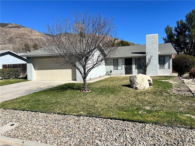 1787 N Ella Mae Ln, San Jacinto, CA 92583 - ranch-style home featuring a front yard, an attached garage, stucco siding, a chimney, and concrete driveway
