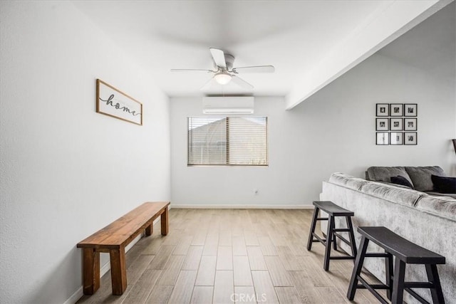1787 N Ella Mae Ln, San Jacinto, CA 92583 - interior space with a ceiling fan, light wood-type flooring, a wall mounted air conditioner, and baseboards