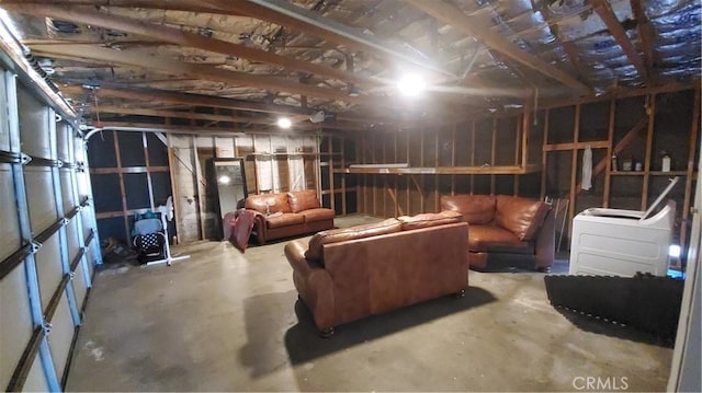 interior space featuring a garage and washer / clothes dryer