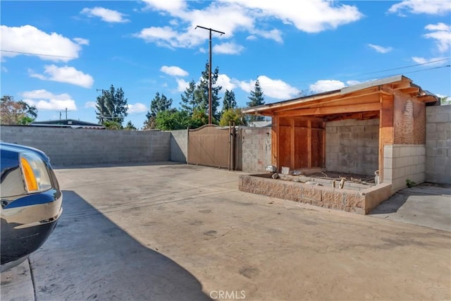 exterior space with a gate and fence