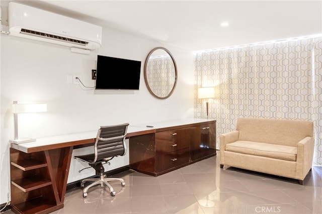 office featuring a wall mounted air conditioner, built in desk, and light tile patterned floors