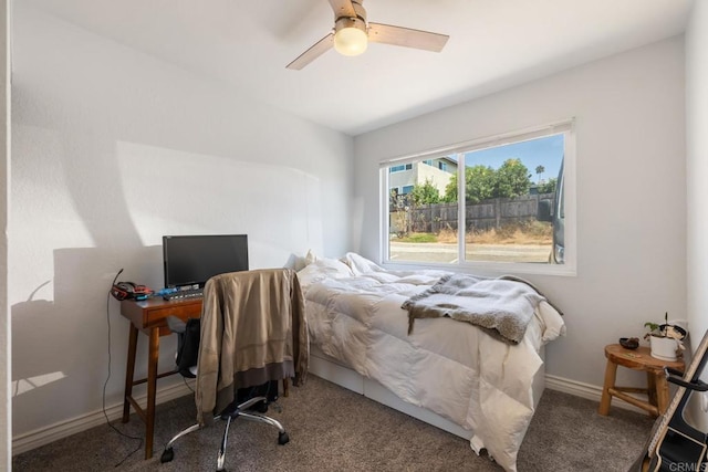 bedroom with carpet, baseboards, and a ceiling fan