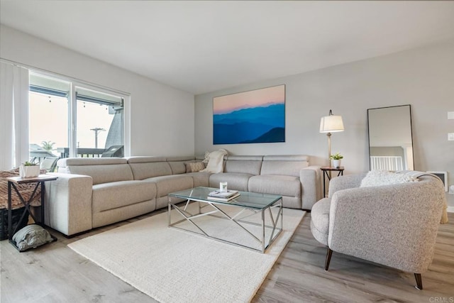 living room featuring light wood-style flooring