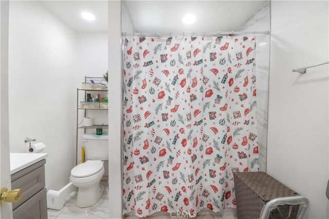 8181 Date St, Fontana, CA 92335 - full bath with a shower with shower curtain, marble finish floor, toilet, and vanity
