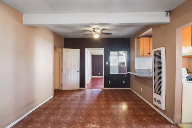 8181 Date St, Fontana, CA 92335 - kitchen with washer / dryer, beamed ceiling, baseboards, and a ceiling fan