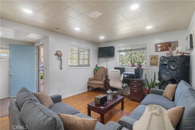 8181 Date St, Fontana, CA 92335 - living room with baseboards, wood finished floors, and recessed lighting