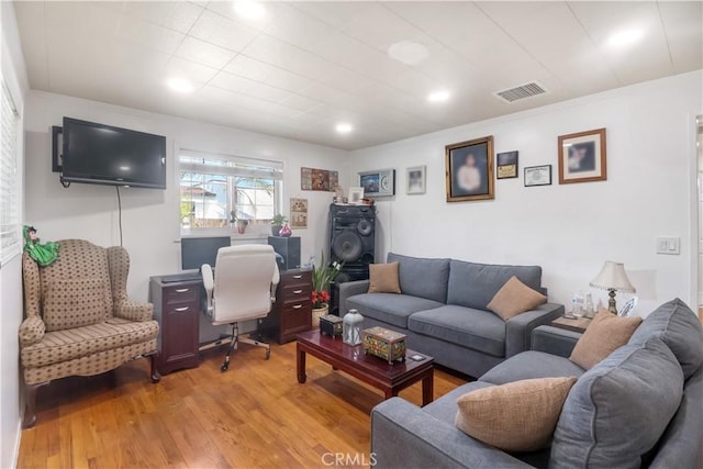 8181 Date St, Fontana, CA 92335 - living area featuring light wood-type flooring and visible vents