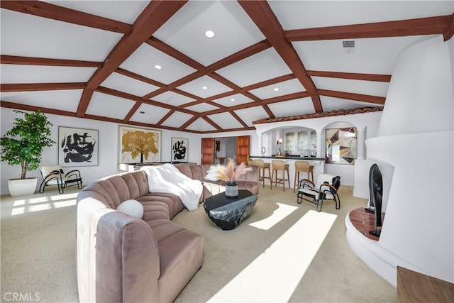 living room with lofted ceiling with beams, visible vents, carpet floors, and recessed lighting