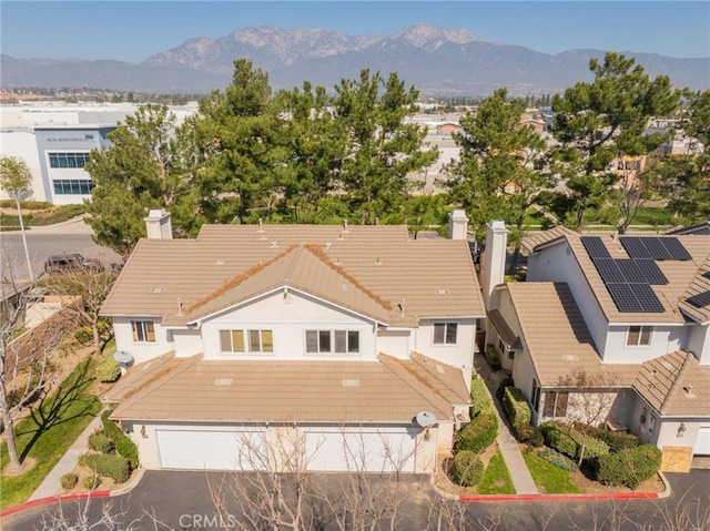 bird's eye view featuring a residential view and a mountain view